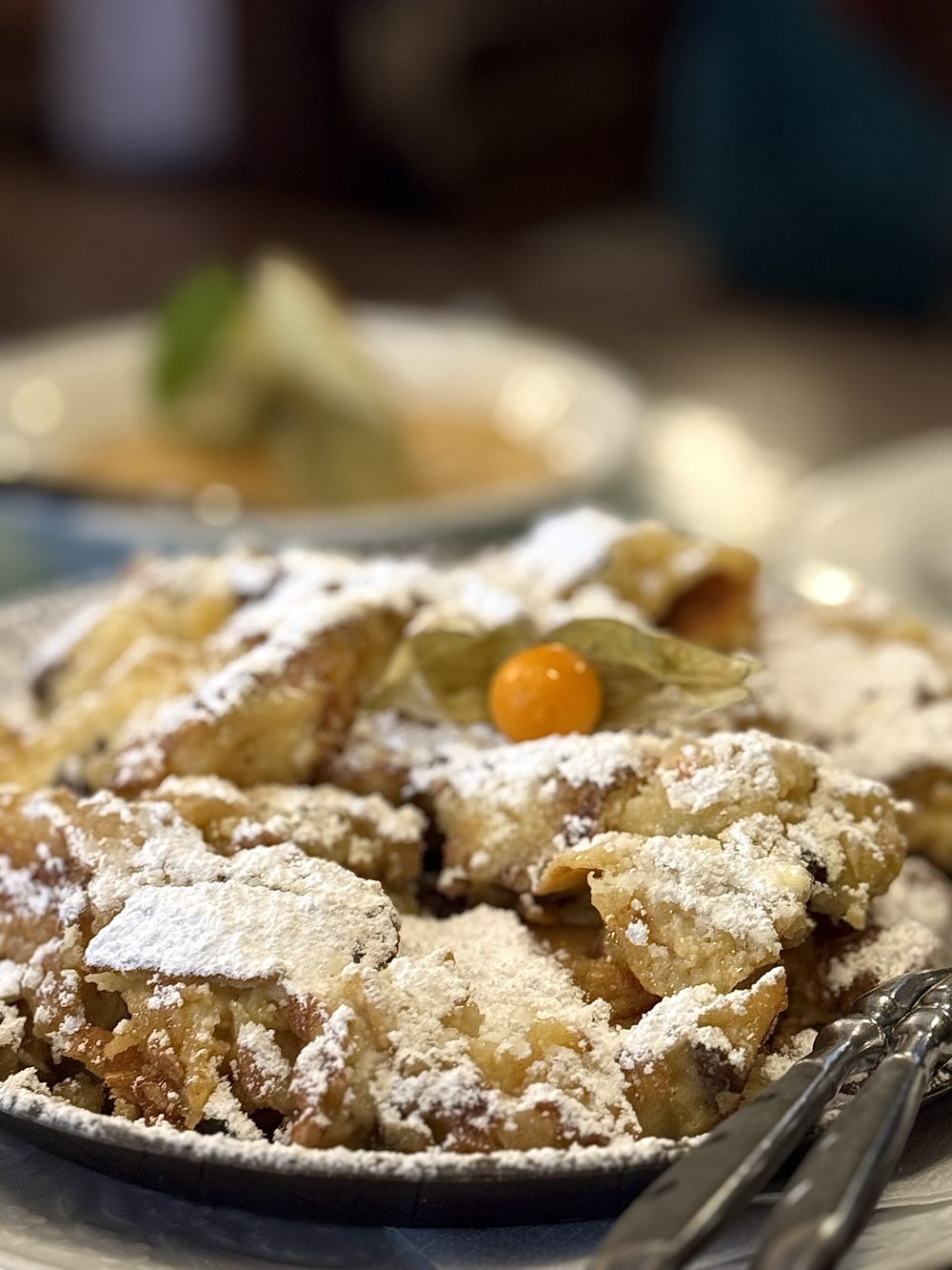 Kaiserschmarrn dessert dusted with icing sugar.